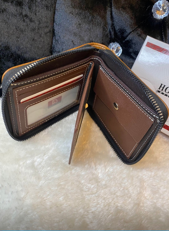 A men’s black and brown detailed wallet