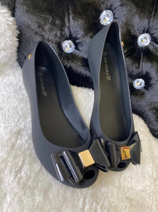 Black bow and gold buckle ballet shoes