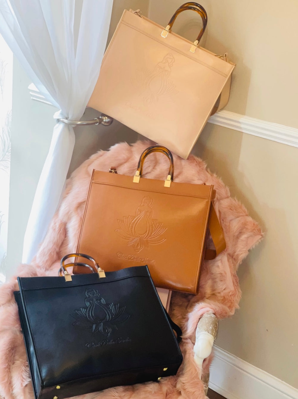 Three colours of the faux leather cbs tote bag in brown, nude and black