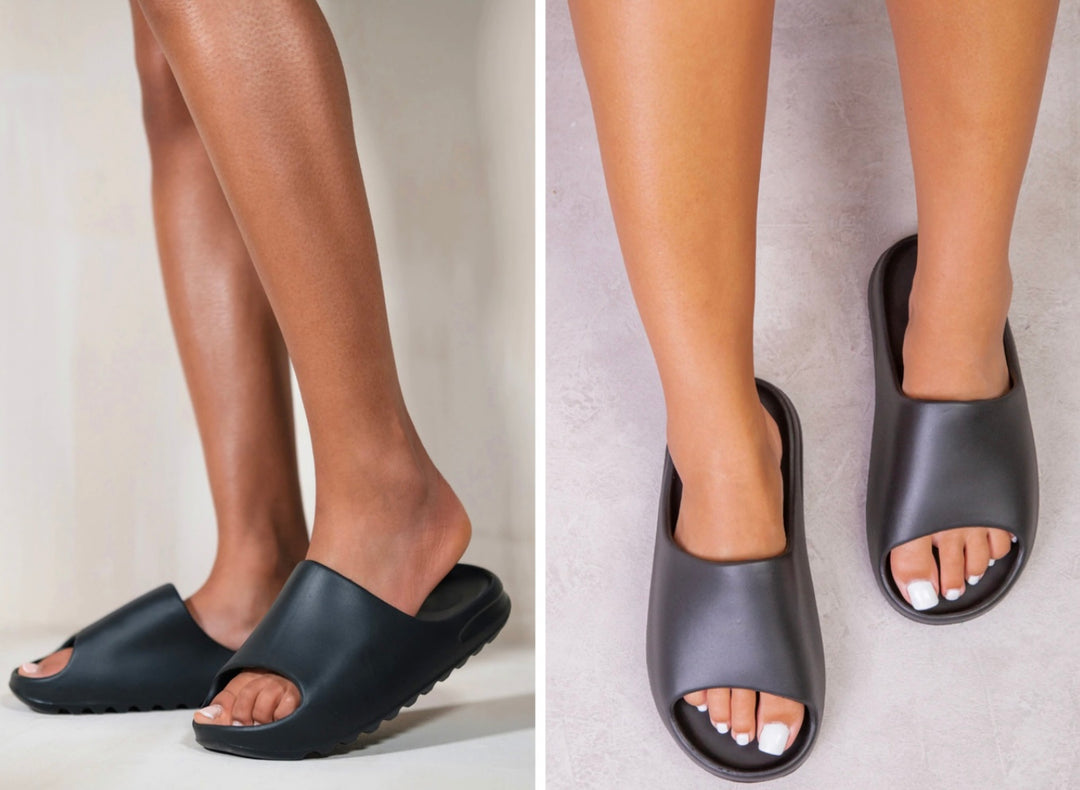 A pair of black plastic style slip on slides/ sliders 