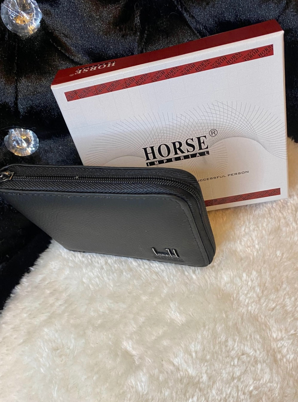 Black zip up men’s wallet