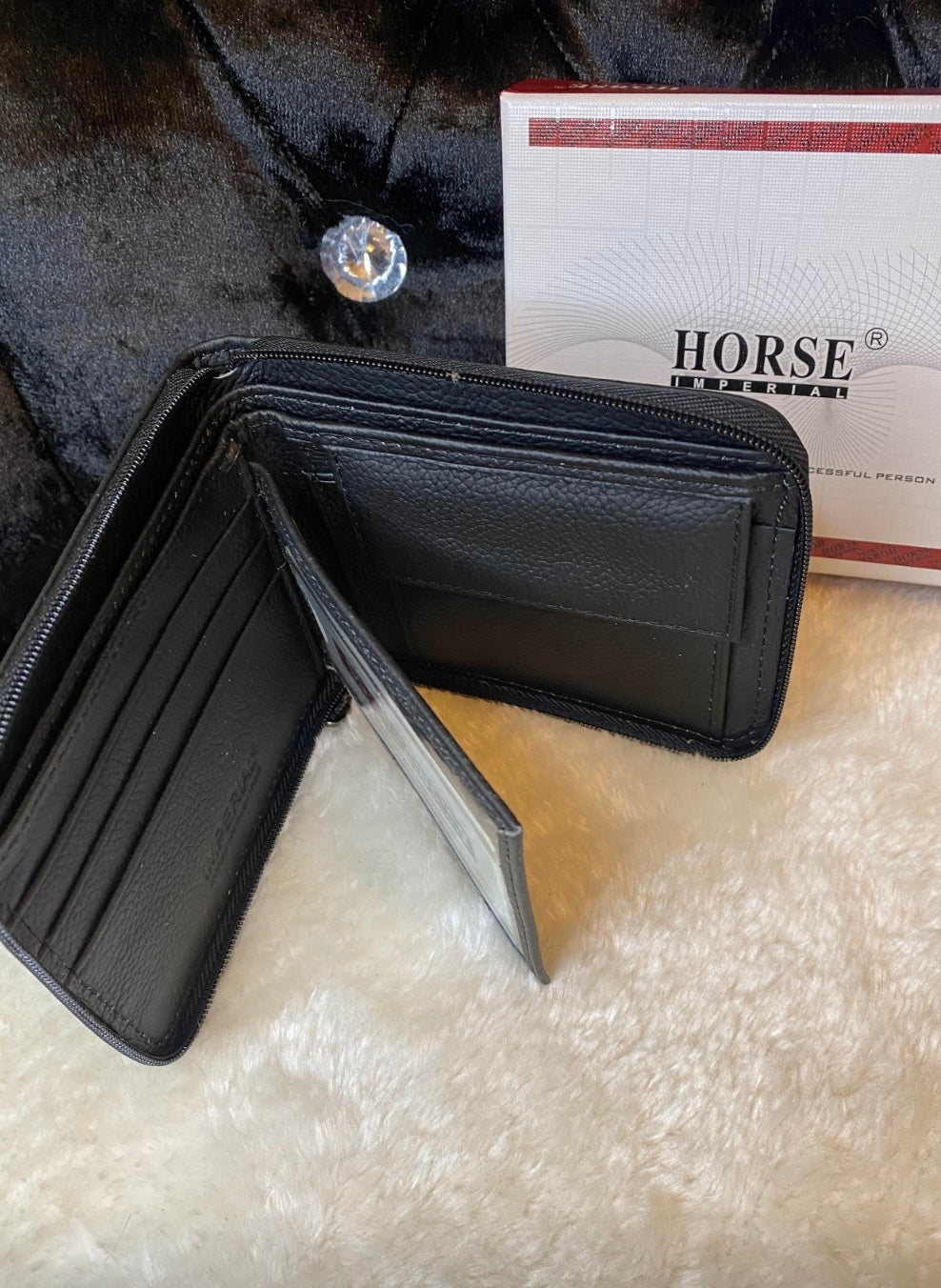 Black zip up men’s wallet