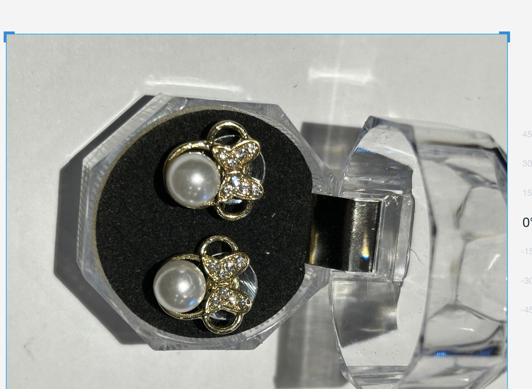 Bow silhoutte style pearl earrings