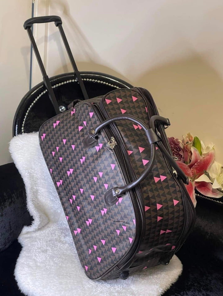 Brown and pink triangle print hold-all travel bag 