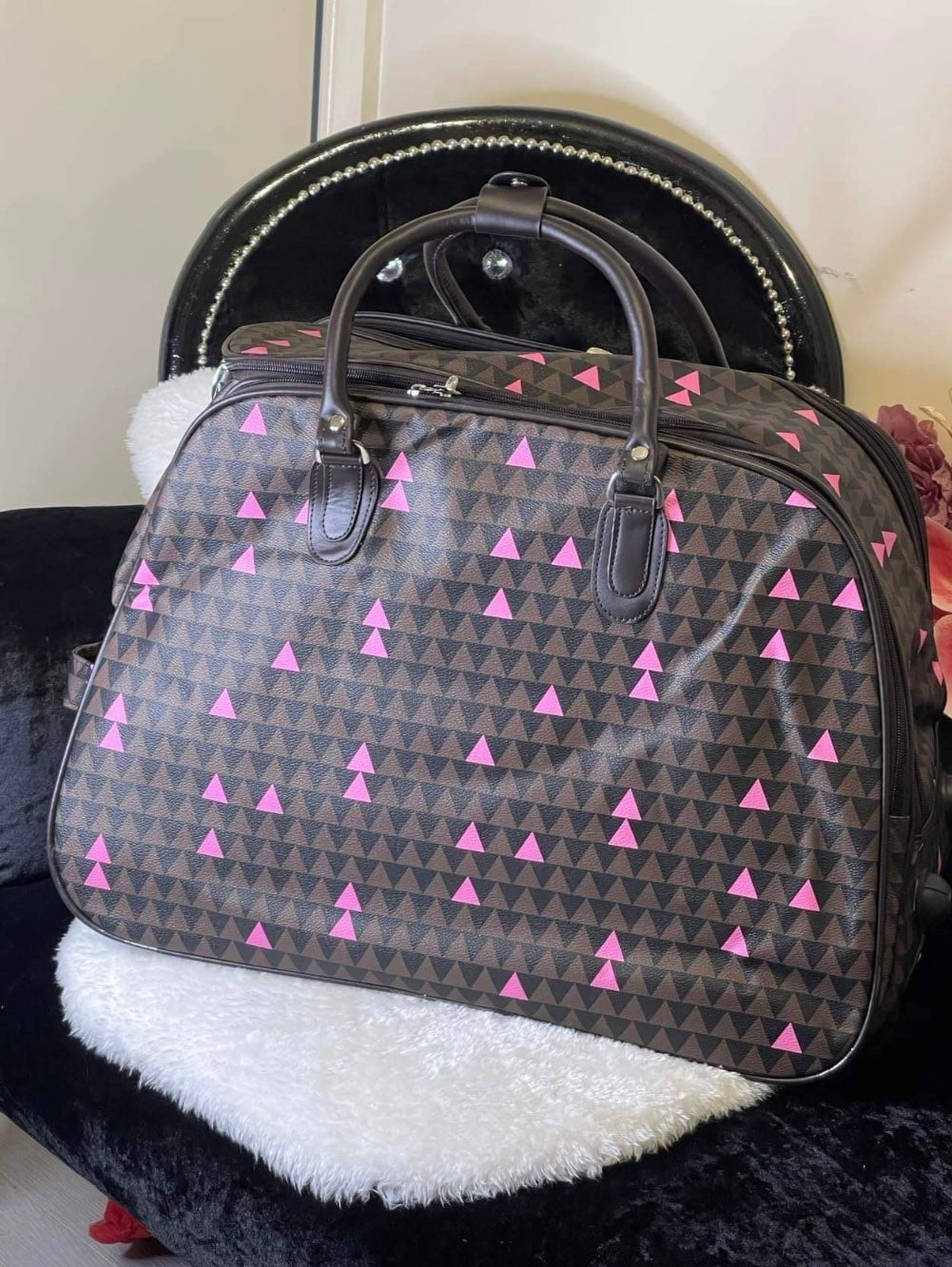 Brown and pink triangle print hold-all travel bag 