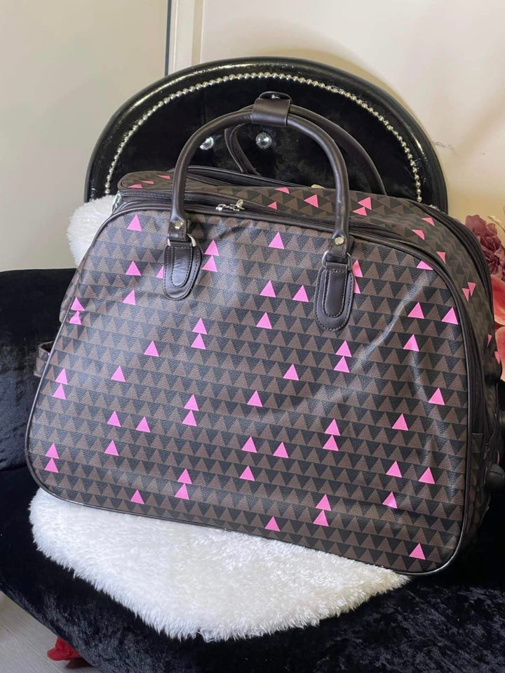 Brown and pink triangle print hold-all travel bag 