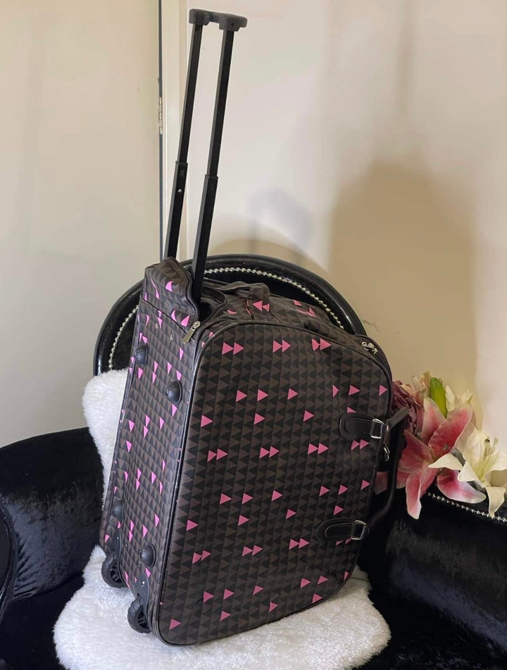 Brown and pink triangle print hold-all travel bag 