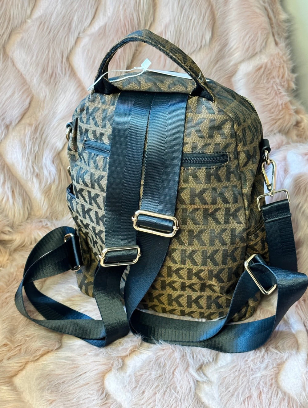 brown monogram backpack with KK print, gold zip details and front pocket