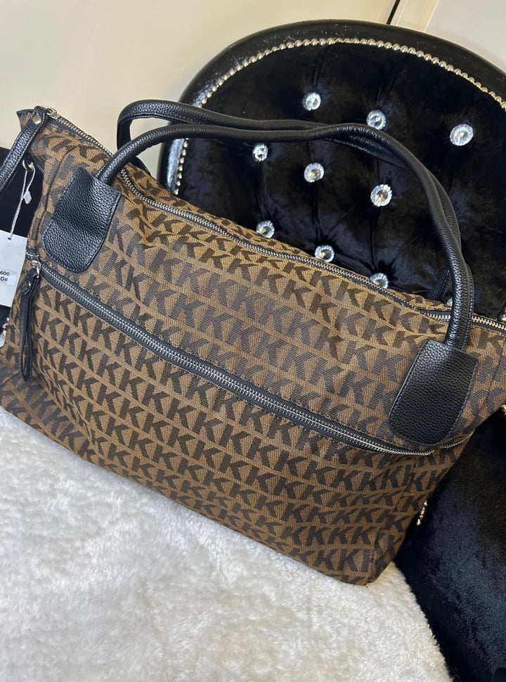 large brown monogram duffle bag with KK print, black handles and zip fastening
