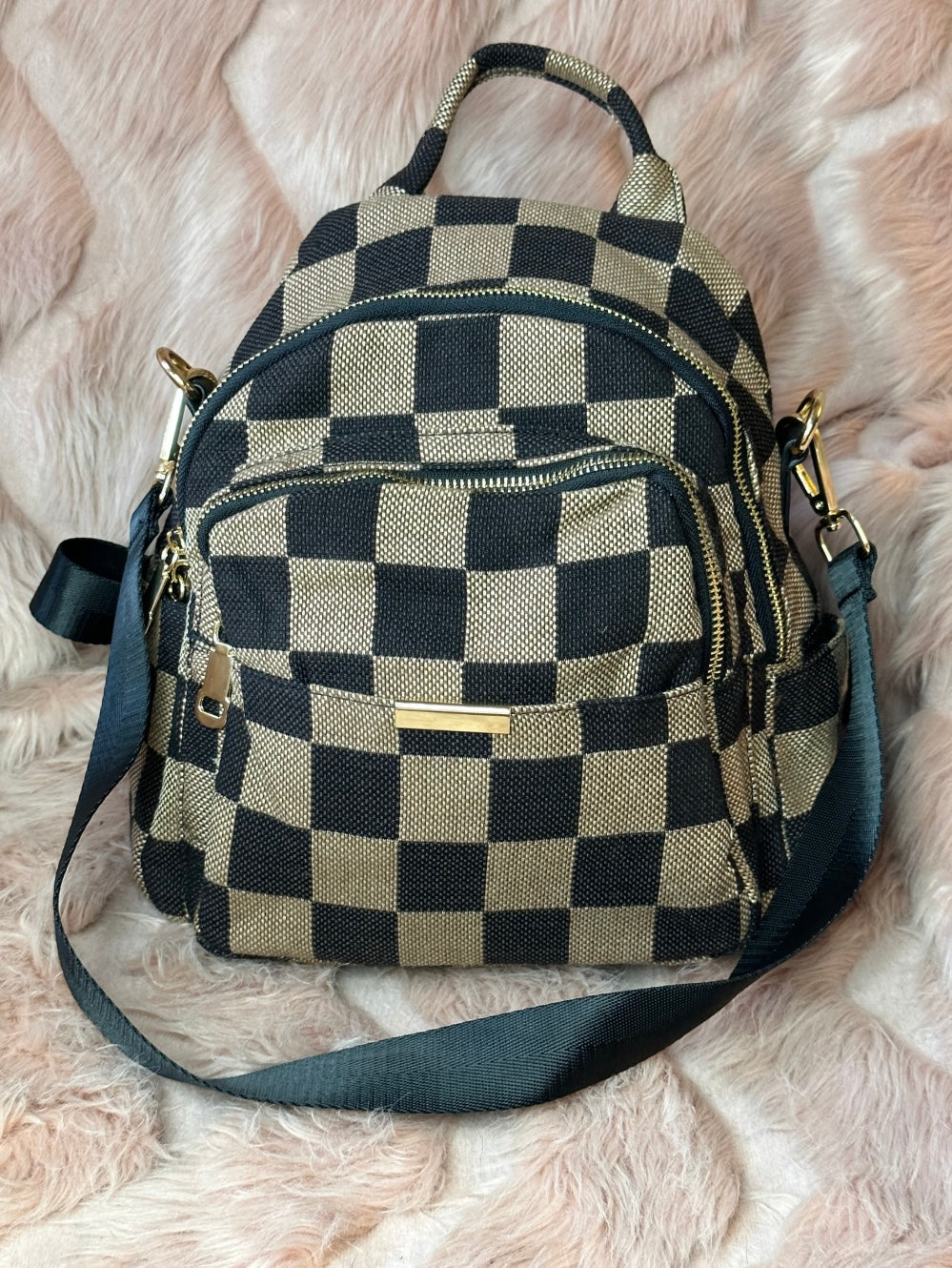 Brown checked rucksack