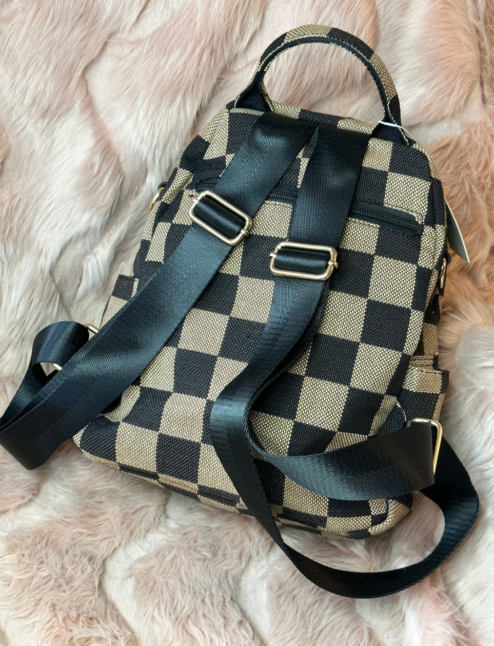 Brown checked rucksack